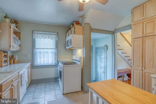 a room with a bed and a cabinets