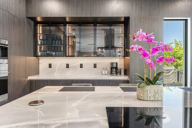 a workspace with furniture and potted plant