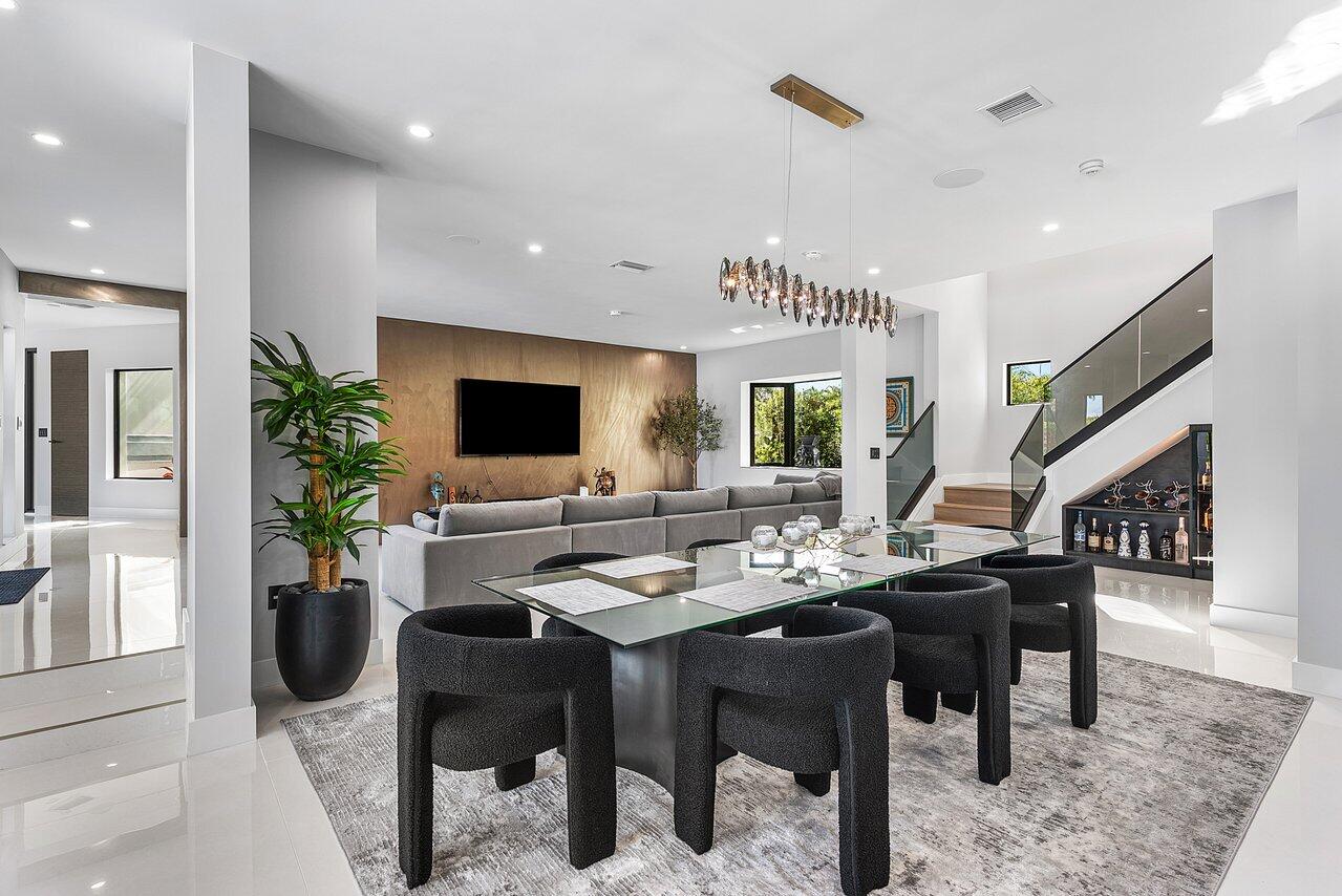 8387 Sawpine Road Delray Beach, FL 33446 - Photo 10 of 57 a dinning room with furniture