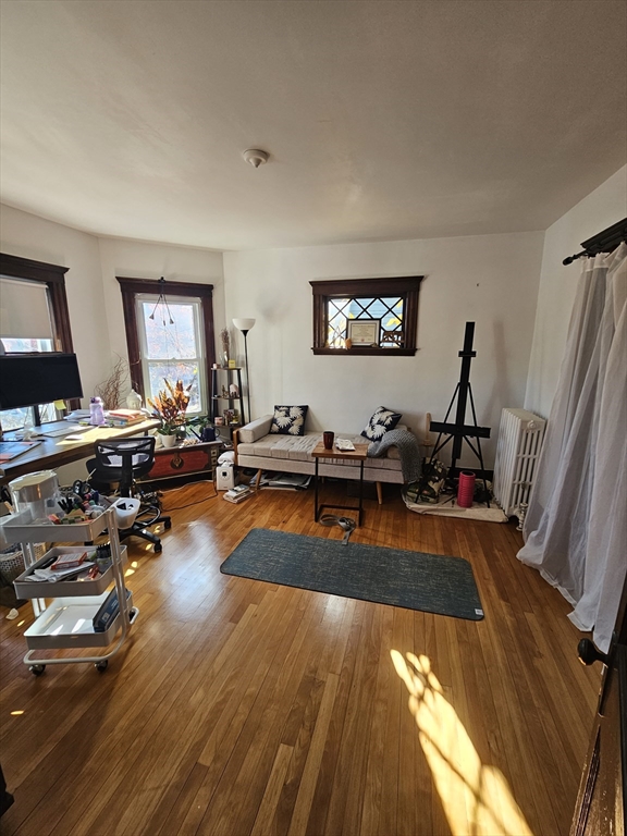 13 Roberts Road Cambridge, MA 02138 - Photo 15 of 23 a view of a living room with furniture