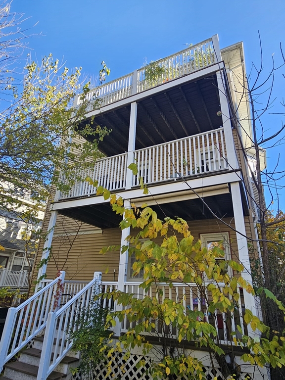 13 Roberts Road Cambridge, MA 02138 - Photo 4 of 23 a view of balcony with a garden