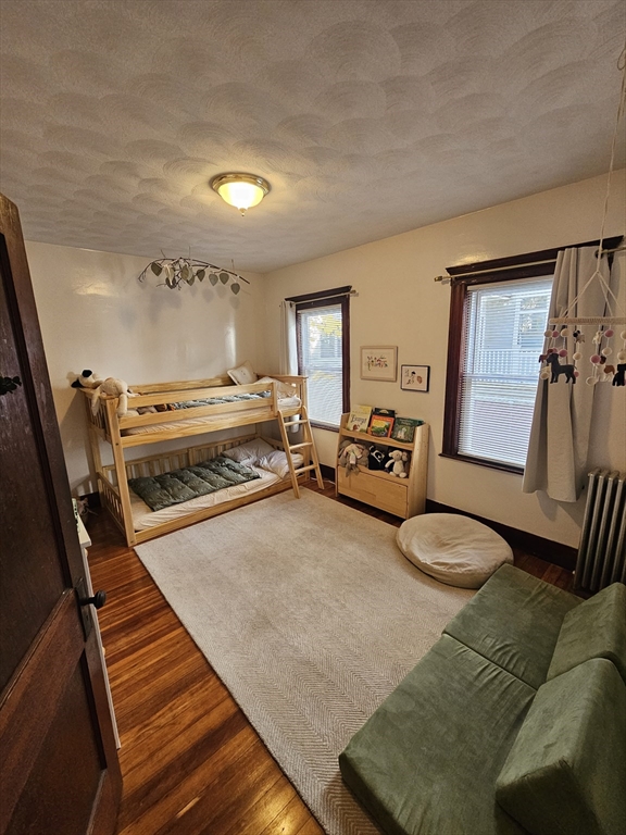 13 Roberts Road Cambridge, MA 02138 - Photo 10 of 23 a living room with furniture and a couch