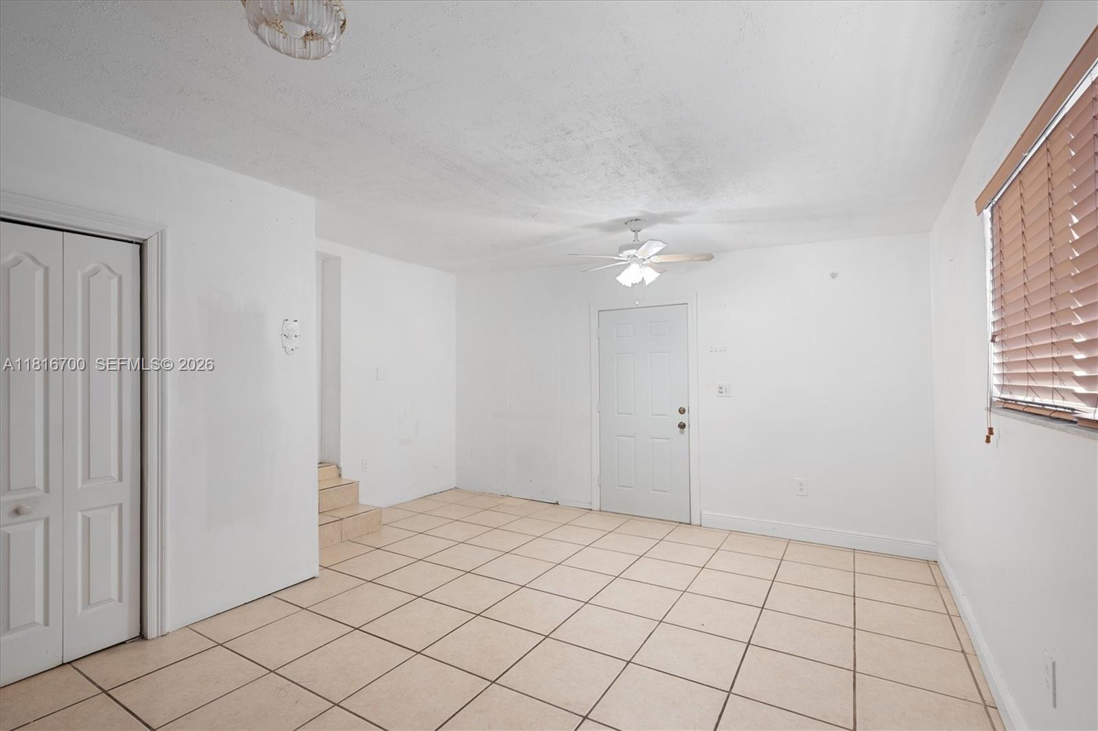 5726 Southwest 20th Street Miami, FL 33155 - Photo 24 of 27 a view of an empty room and window