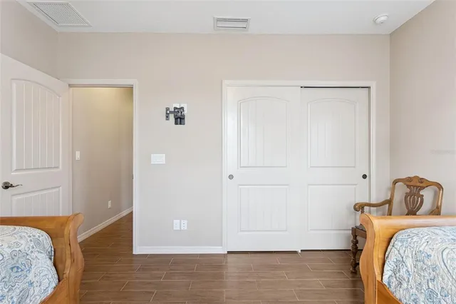 a view of bedroom with hardwood floor