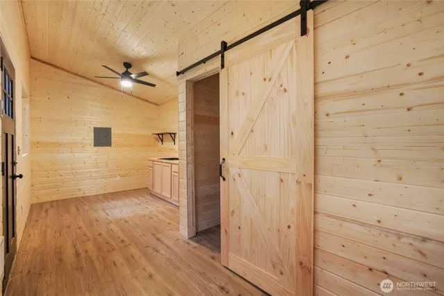 a bathroom with a sink mirror toilet and shower
