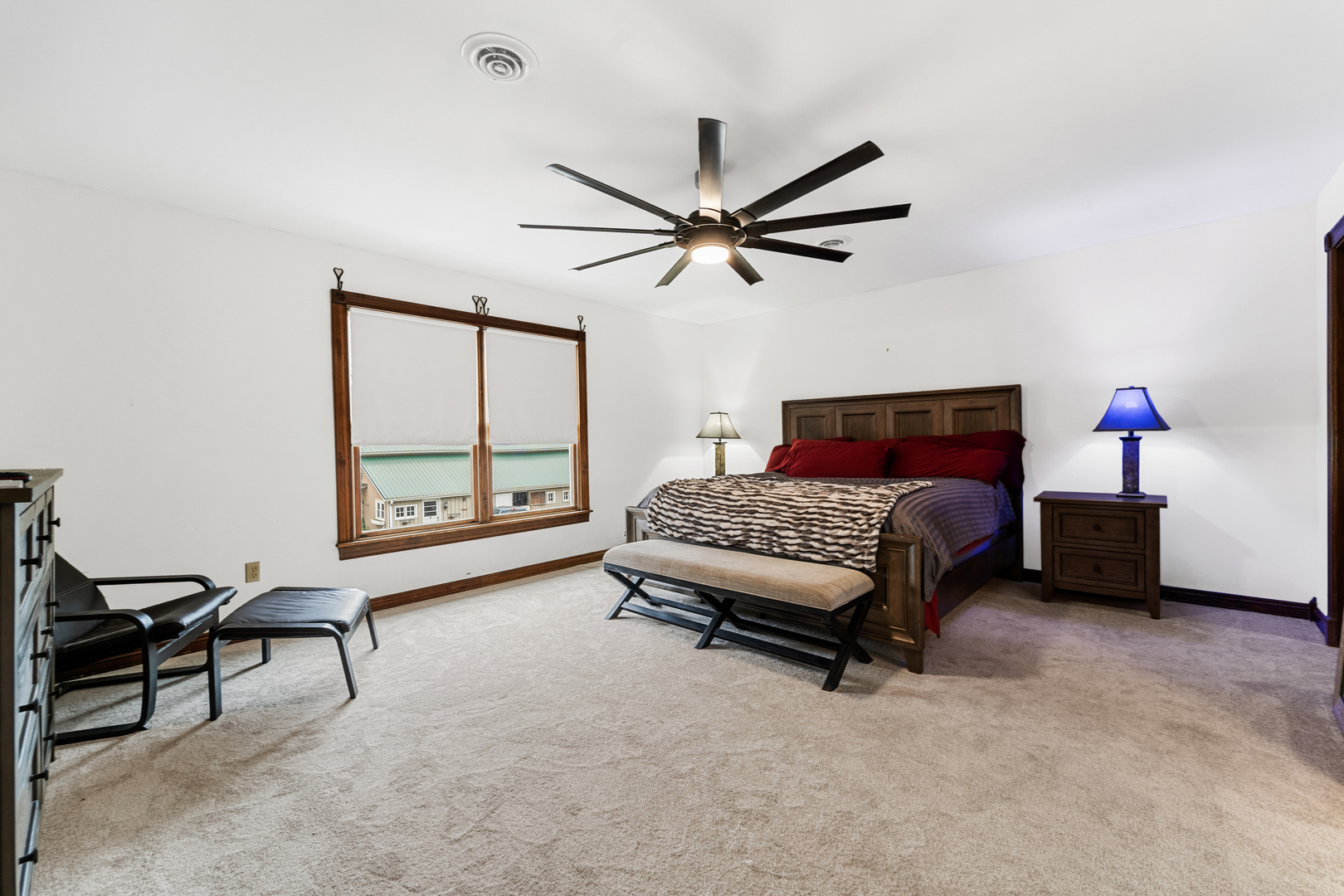 3104 East Delite Inn Road Beecher, IL 60401 - Photo 44 of 59 a bedroom with a bed and a chandelier