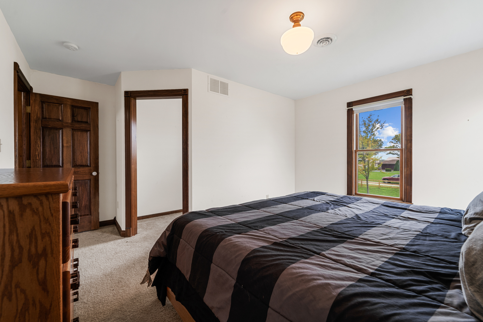 3104 East Delite Inn Road Beecher, IL 60401 - Photo 52 of 59 a bedroom with a bed and a window