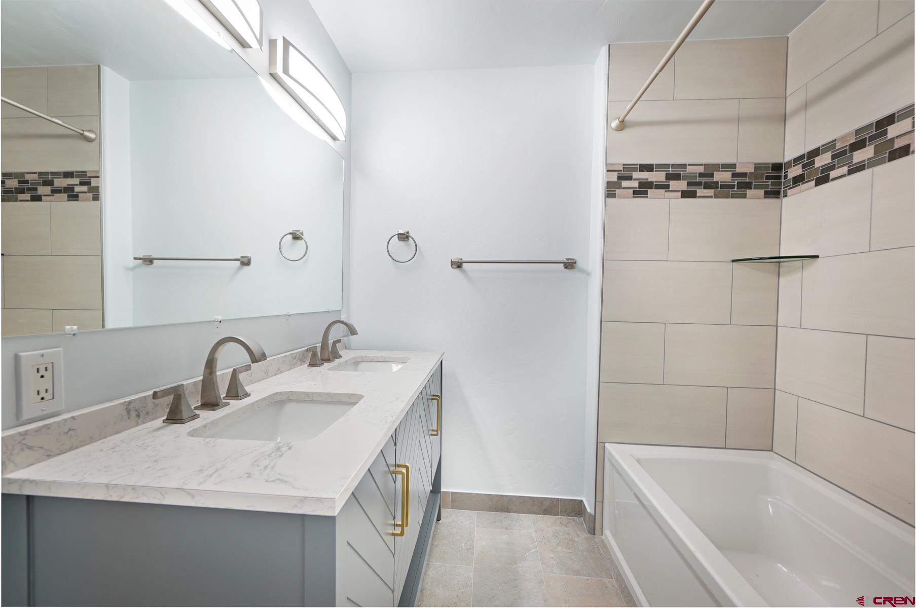 120 Sortais Road Durango, CO 81301 - Photo 14 of 21 a bathroom with a sink and a bathtub
