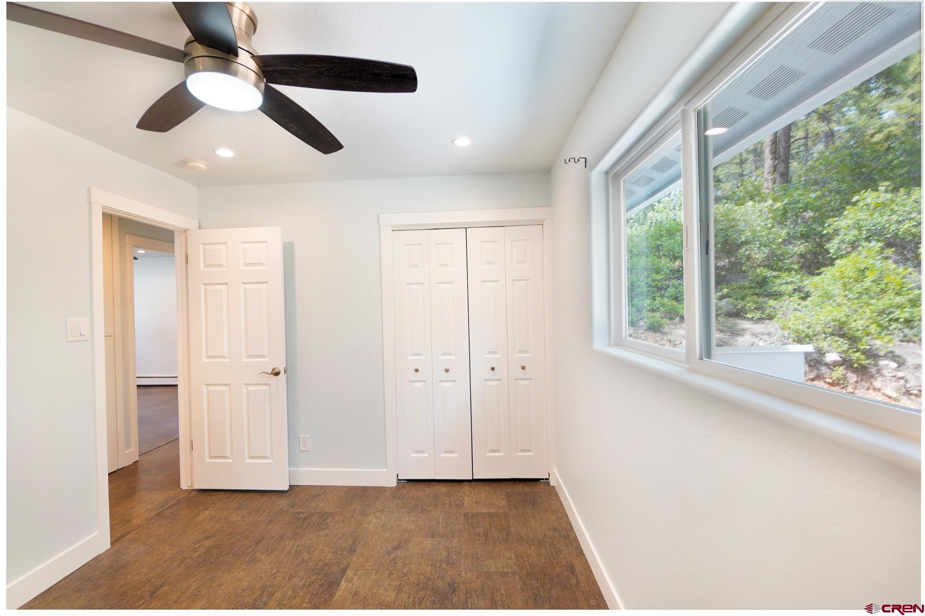 120 Sortais Road Durango, CO 81301 - Photo 15 of 21 a view of an empty room with a window