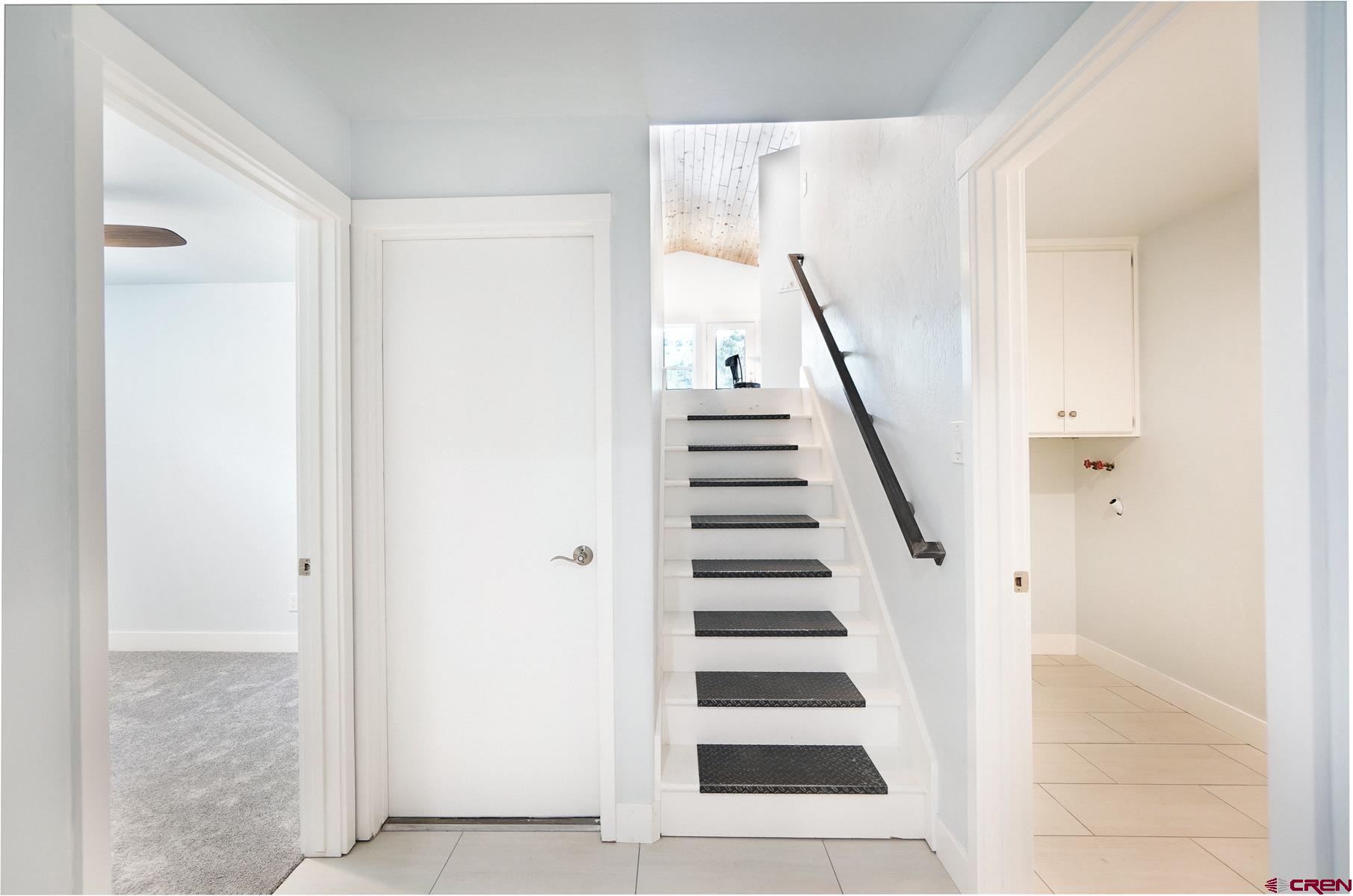 120 Sortais Road Durango, CO 81301 - Photo 16 of 21 a view of entryway with wooden floor and white walls