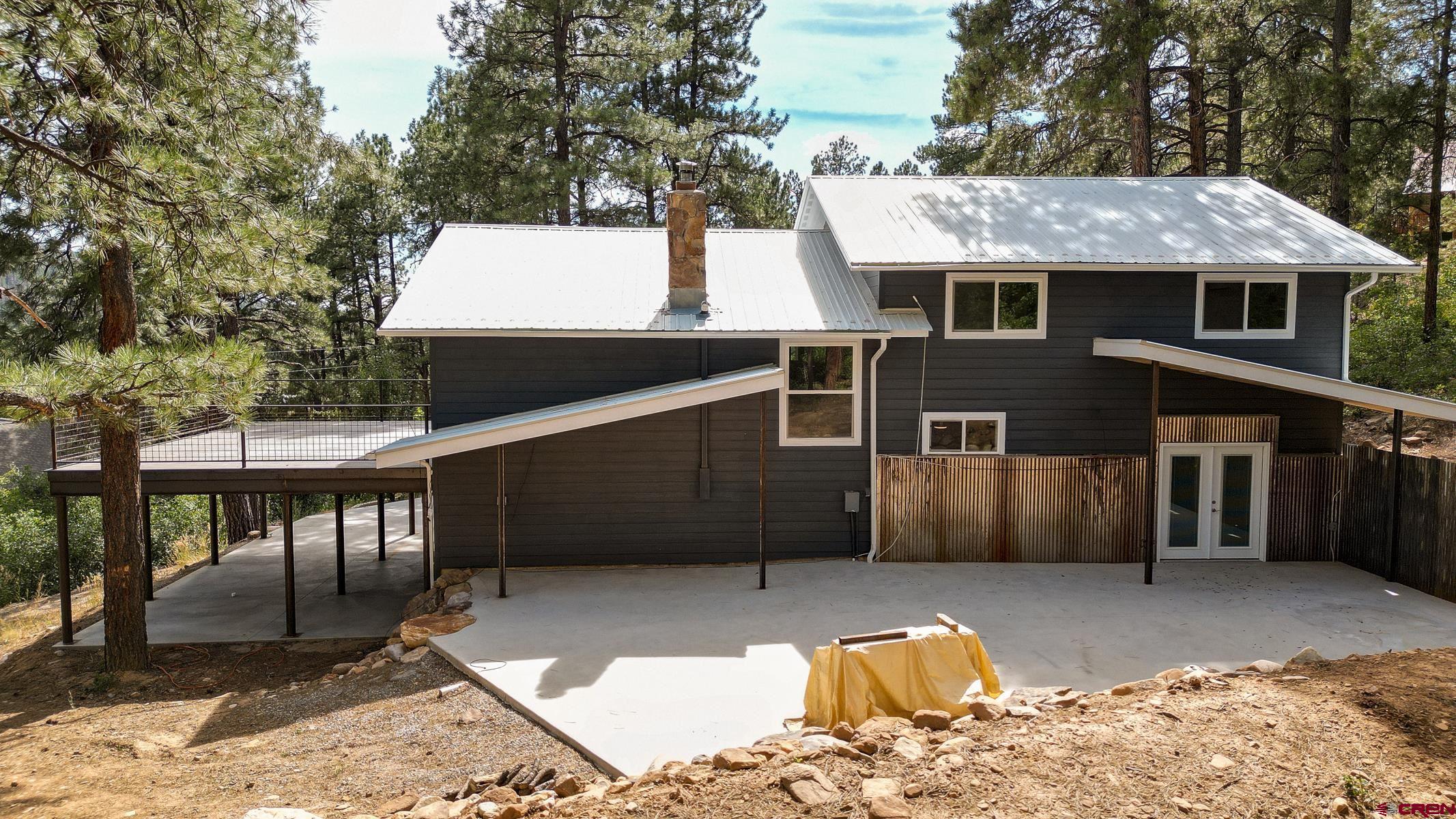 120 Sortais Road Durango, CO 81301 - Photo 19 of 21 a front view of a house with a yard