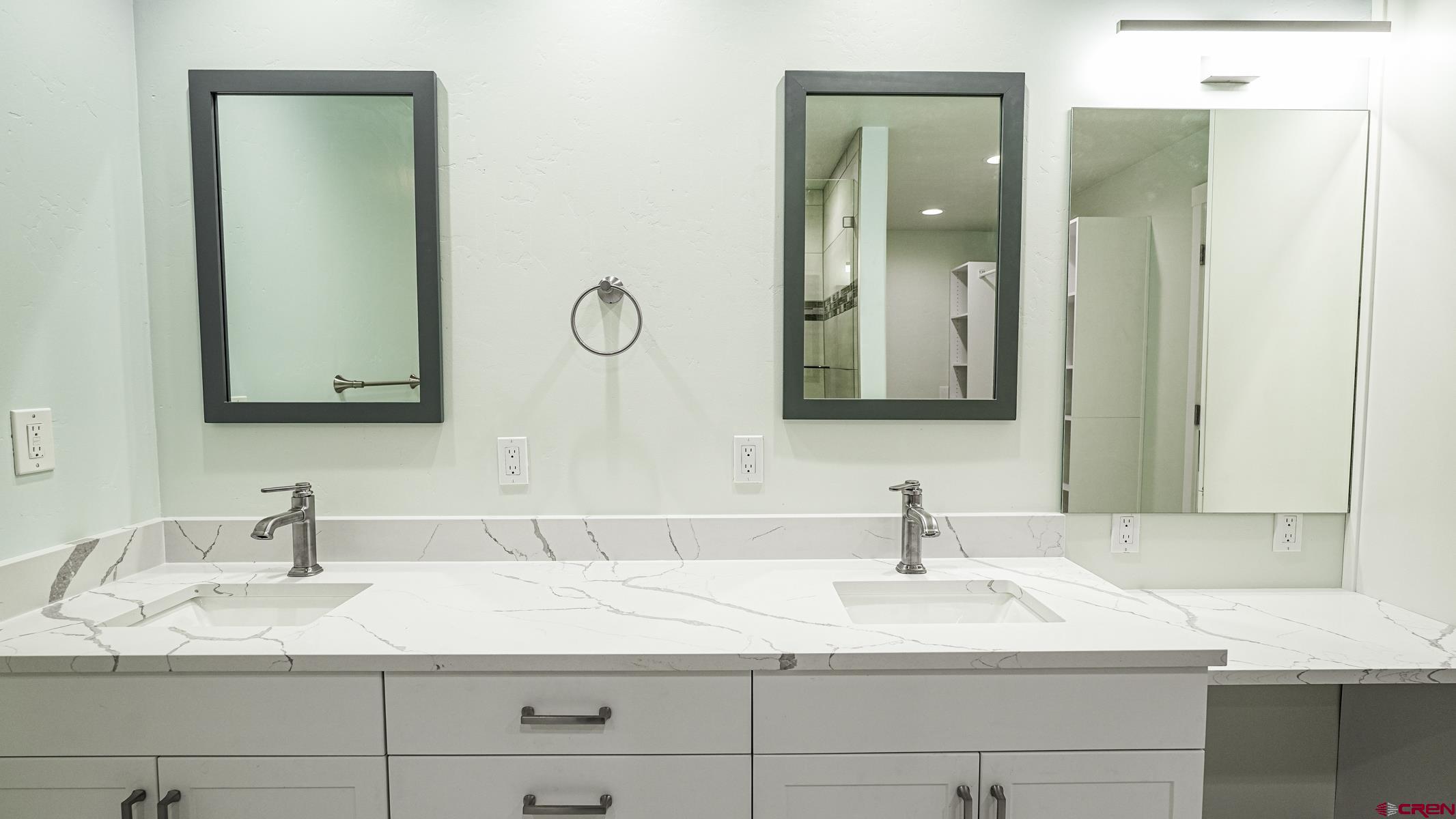 120 Sortais Road Durango, CO 81301 - Photo 8 of 21 a bathroom with double sink and a mirror