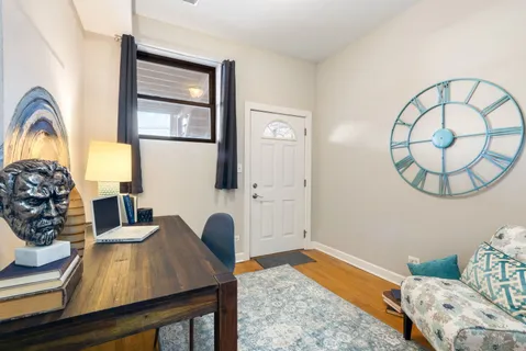 a view of a livingroom with furniture and window