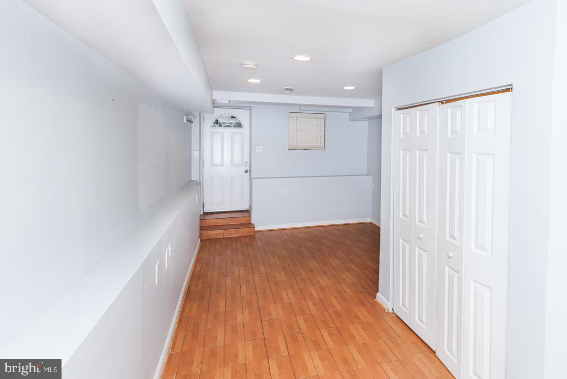 1437 East Capitol Street Southeast, Unit B Washington, DC 20003 - Photo 11 of 20 a view of hallway with wooden floor