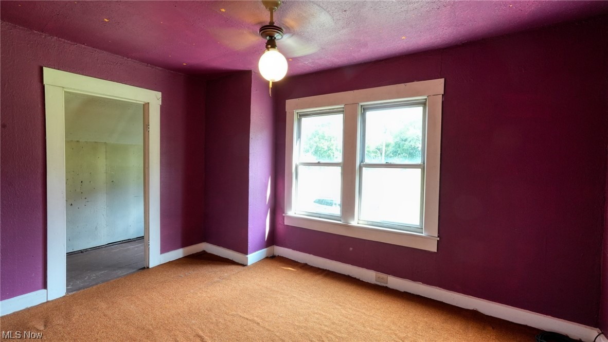 40862 Rado Ridge Road Caldwell, OH 43724 - Photo 16 of 35 Bedroom 3 featuring light carpet and a textured ceiling