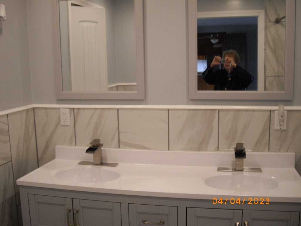 198 Sinpatch Road Amenia, NY 12592 - Photo 15 of 35 a bathroom with a sink and mirror
