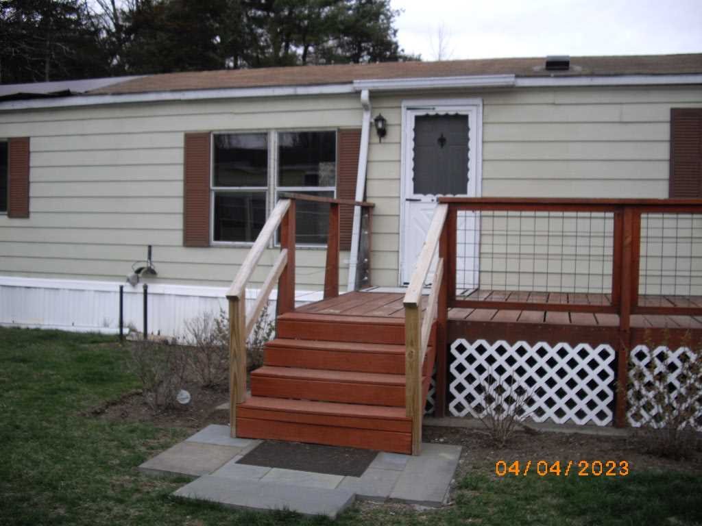 198 Sinpatch Road Amenia, NY 12592 - Photo 20 of 35 a front view of a house with a garden