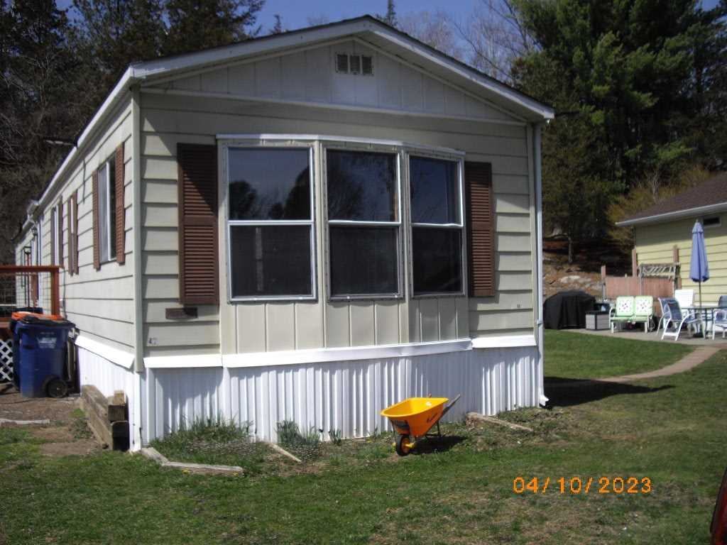 198 Sinpatch Road Amenia, NY 12592 - Photo 25 of 35 a front view of a house with a yard