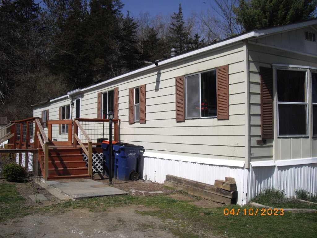 198 Sinpatch Road Amenia, NY 12592 - Photo 3 of 35 a view of a house with backyard and sitting area