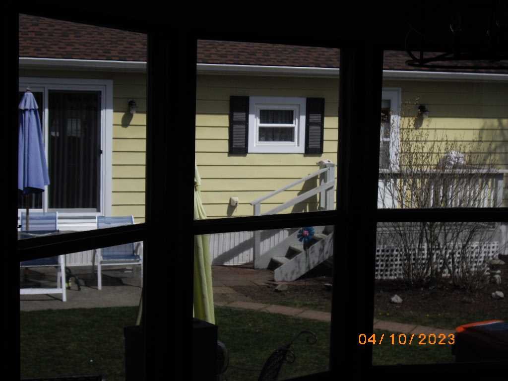 198 Sinpatch Road Amenia, NY 12592 - Photo 32 of 35 a view of a house with a door and a window