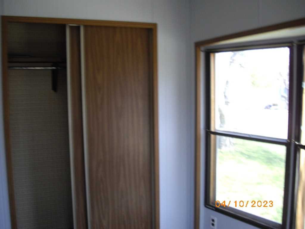 198 Sinpatch Road Amenia, NY 12592 - Photo 10 of 35 a view of an empty room with a window