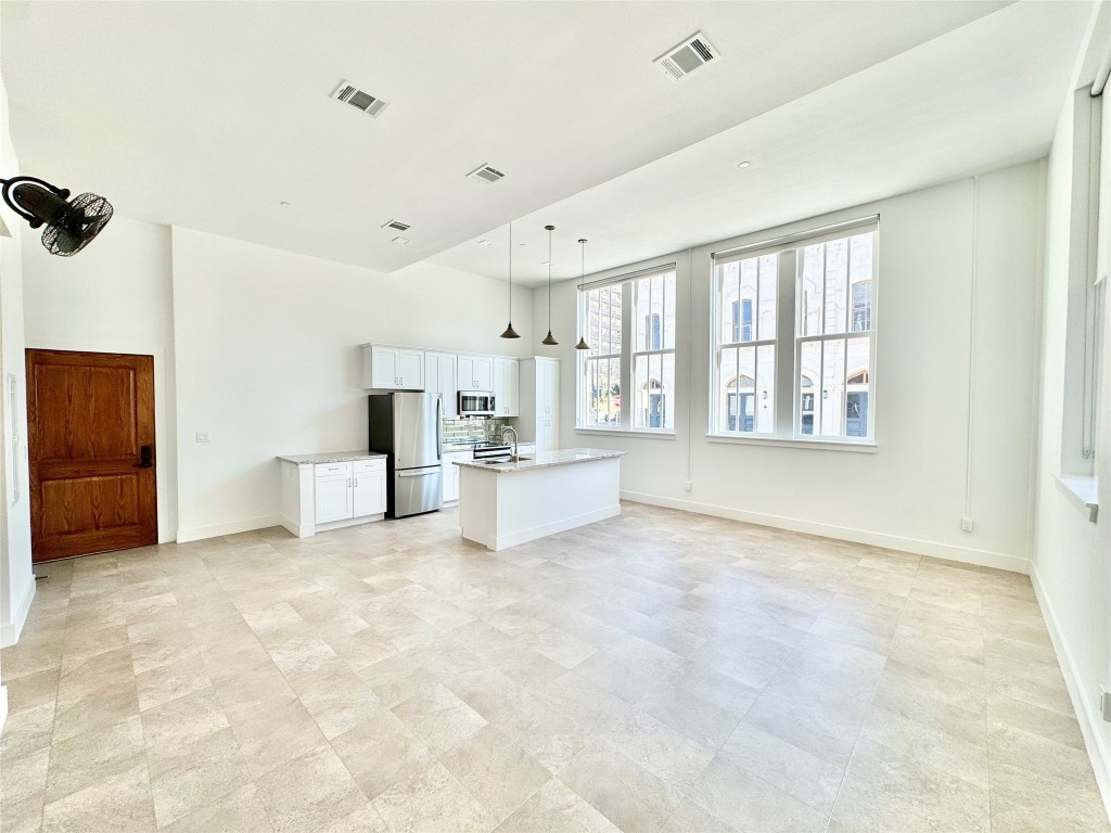Large Kitchen/Living/Dining Area