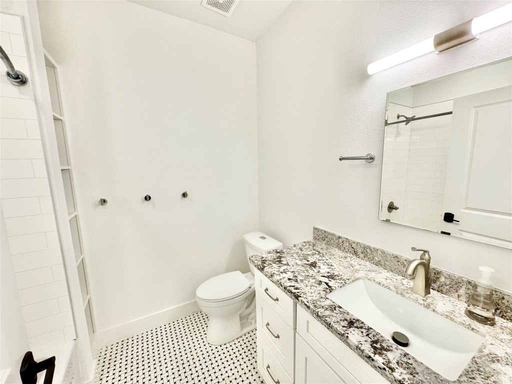 2102 Mechanic Street, Unit 101 Galveston, TX 77550 - Photo 12 of 31 Hall Bathroom