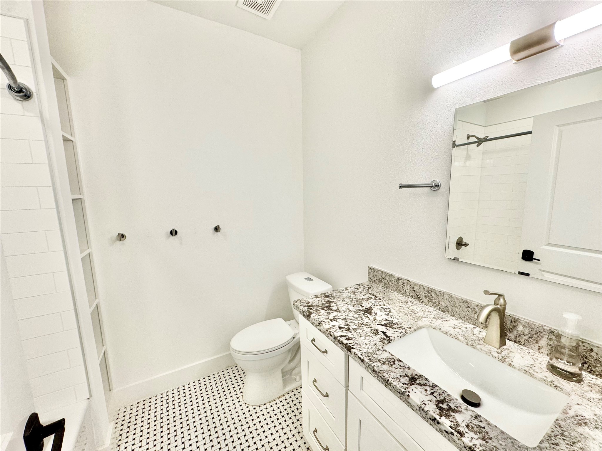 2102 Mechanic Street, Unit 101 Galveston, TX 77550 - Photo 12 of 31 Hall Bathroom
