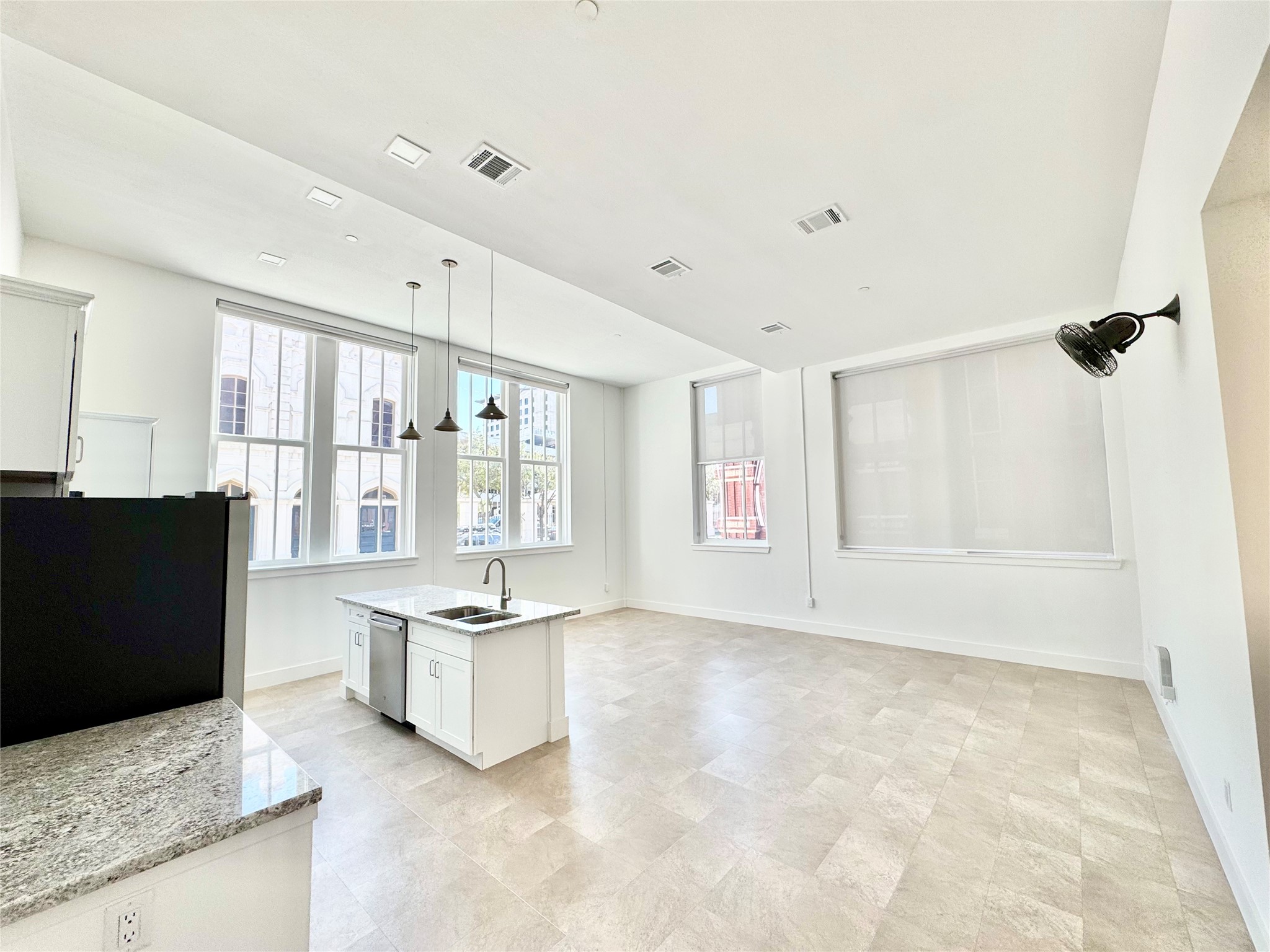 2102 Mechanic Street, Unit 101 Galveston, TX 77550 - Photo 2 of 31 Large Kitchen/Living/Dining Area