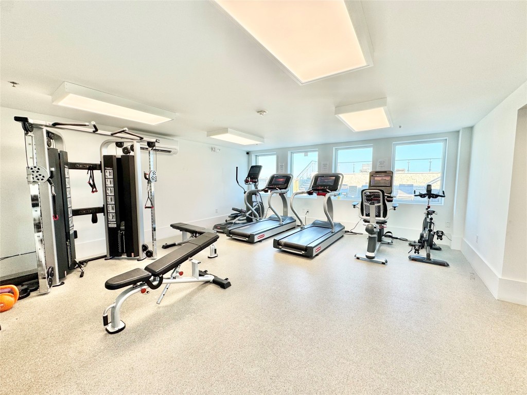 2102 Mechanic Street, Unit 101 Galveston, TX 77550 - Photo 22 of 31 Amenities Access at USNB Apartment Building 2 Blocks Away - Gym