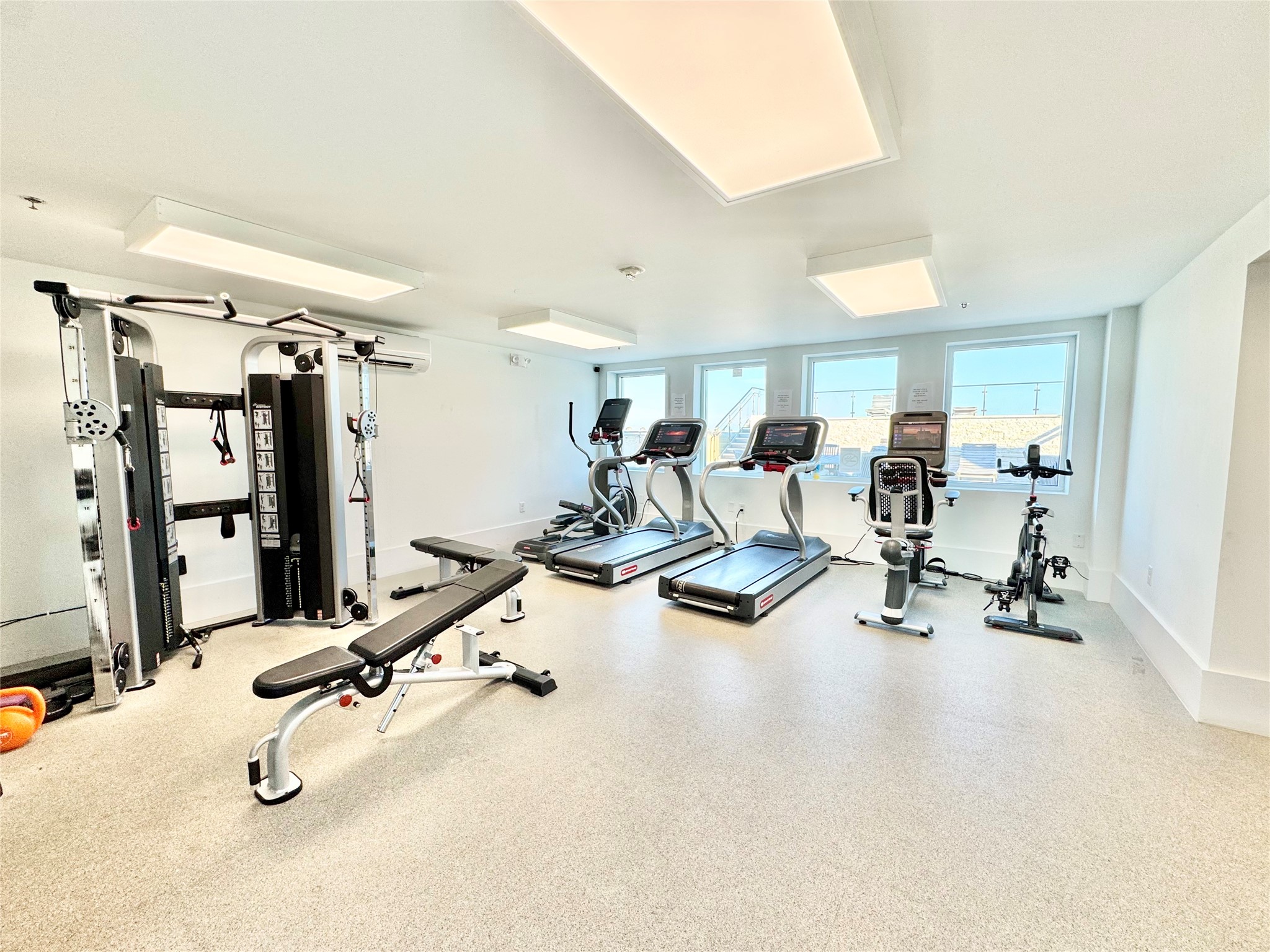 2102 Mechanic Street, Unit 101 Galveston, TX 77550 - Photo 22 of 31 Amenities Access at USNB Apartment Building 2 Blocks Away - Gym