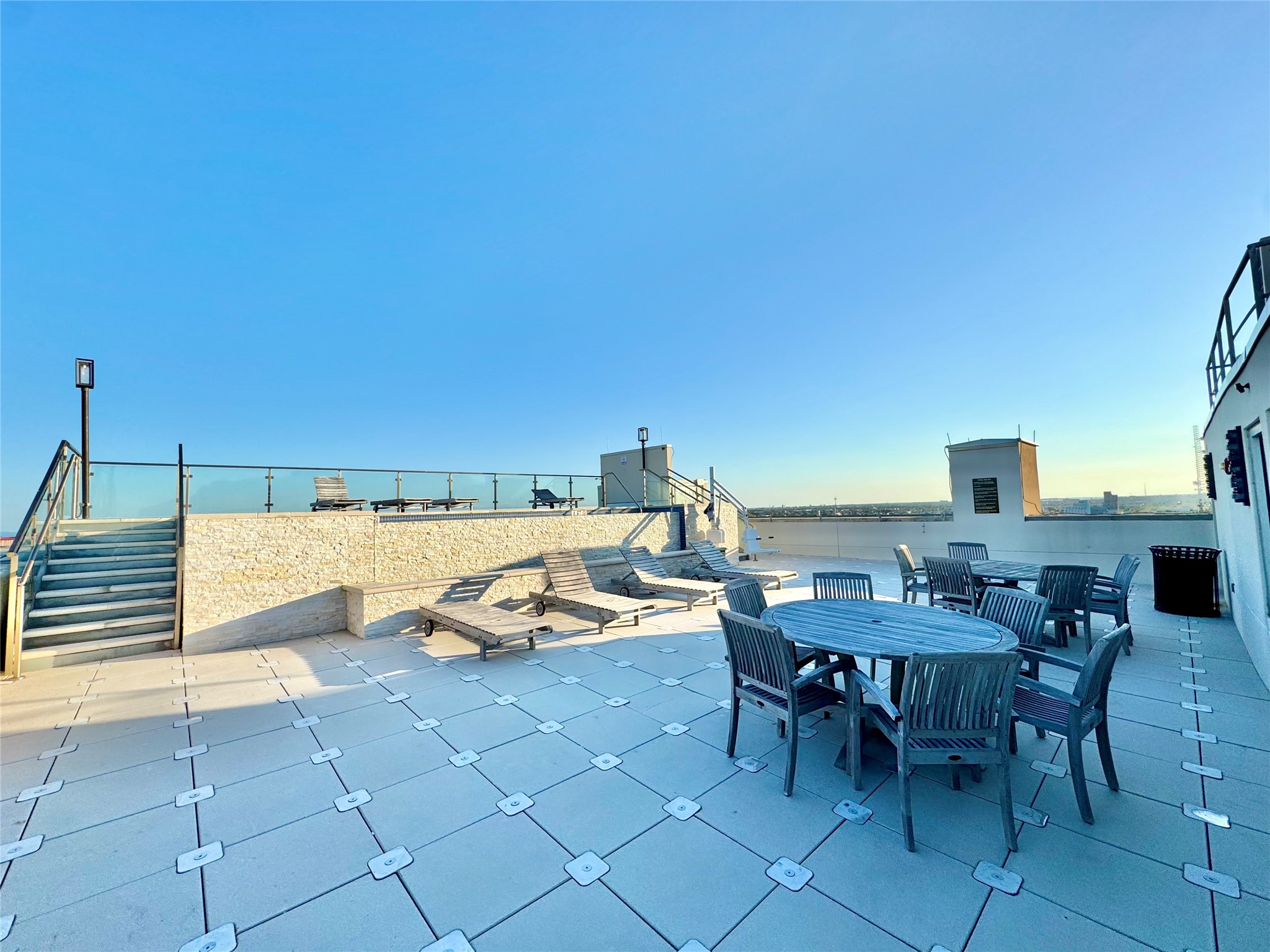 2102 Mechanic Street, Unit 101 Galveston, TX 77550 - Photo 25 of 31 Amenities Access at USNB Apartment Building 2 Blocks Away - Rooftop Patio/Pool