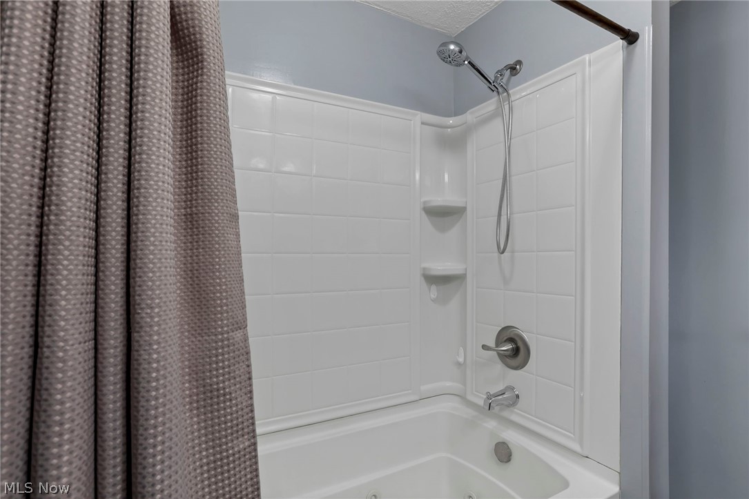 5502 Dutch Ridge Road New Straitsville, OH 43766 - Photo 30 of 49 Full bathroom with shower / bath combo with shower curtain