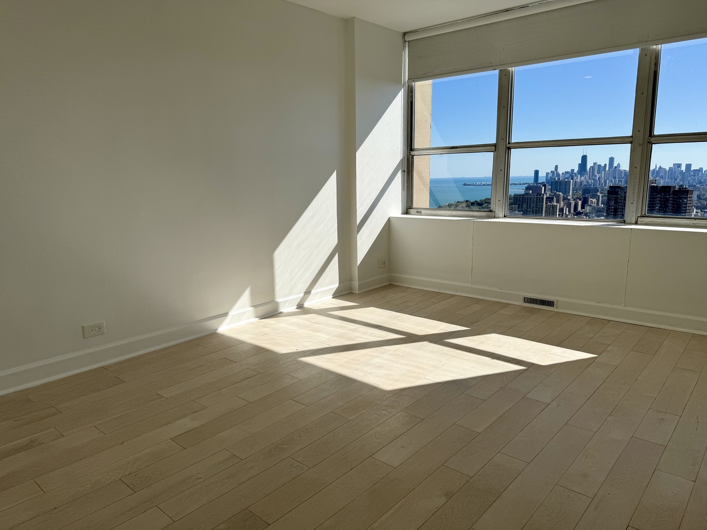 655 West Irving Park Road, Unit 5513 Chicago, IL 60613 - Photo 11 of 17 a view of wooden floor