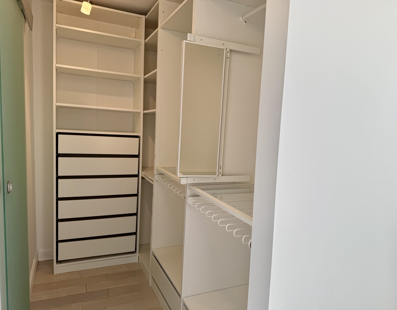 655 West Irving Park Road, Unit 5513 Chicago, IL 60613 - Photo 16 of 17 a view of walk in closet with empty racks