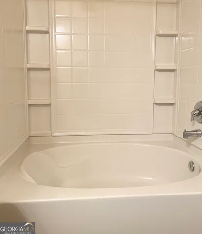a bathroom with a bathtub