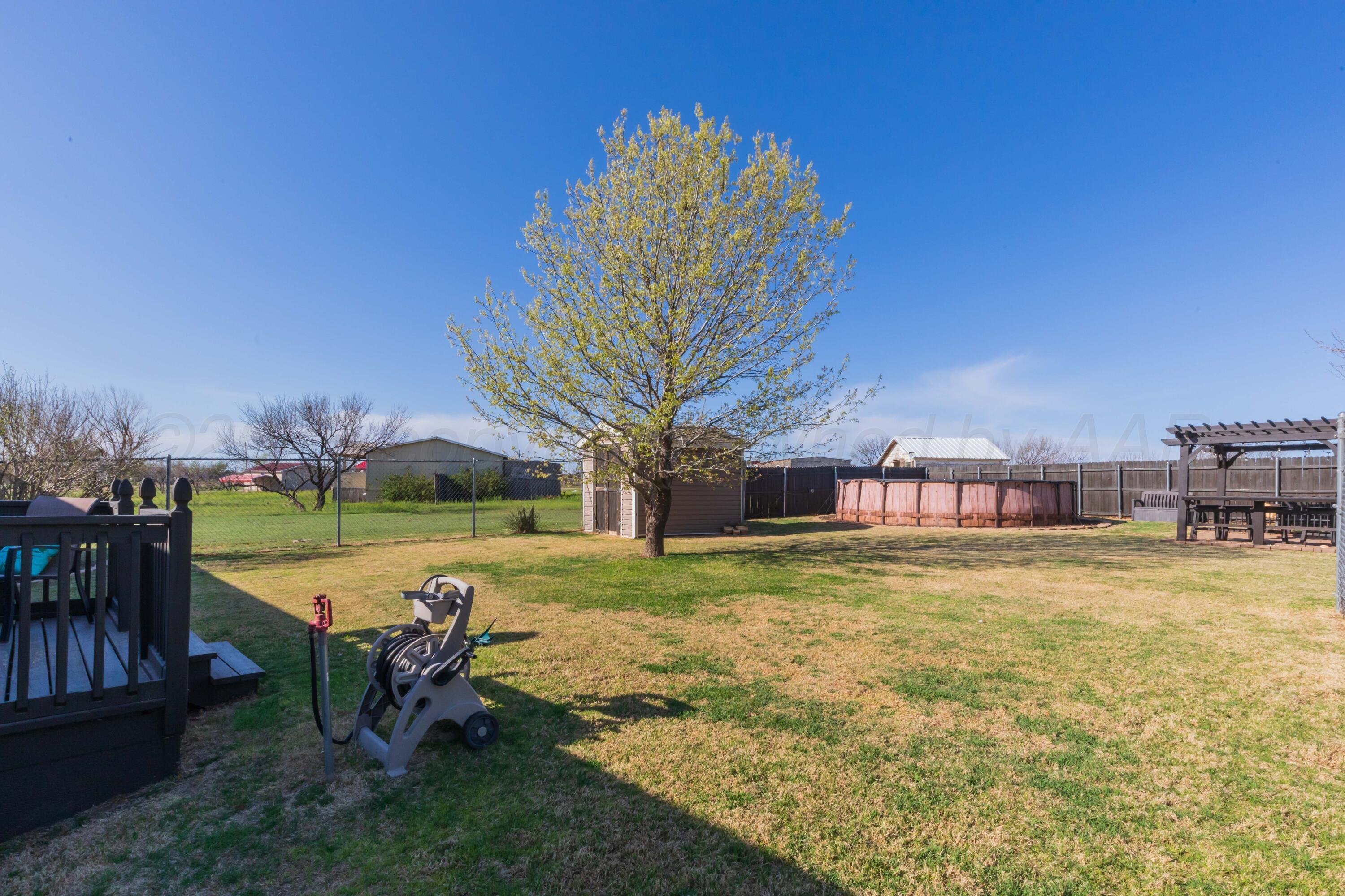 7501 Lobo Trail Amarillo, TX 79124 - Photo 47 of 49 a view of a house with a yard and sitting area