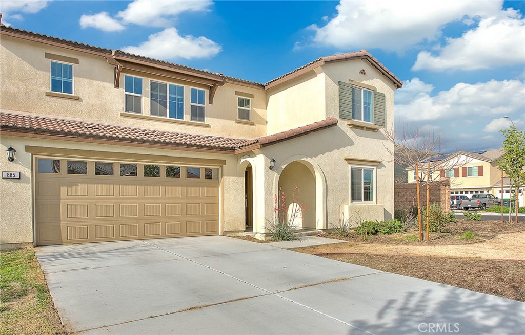 885 Canopy Lane San Jacinto, CA 92583 - Photo 2 of 75 a front view of a house