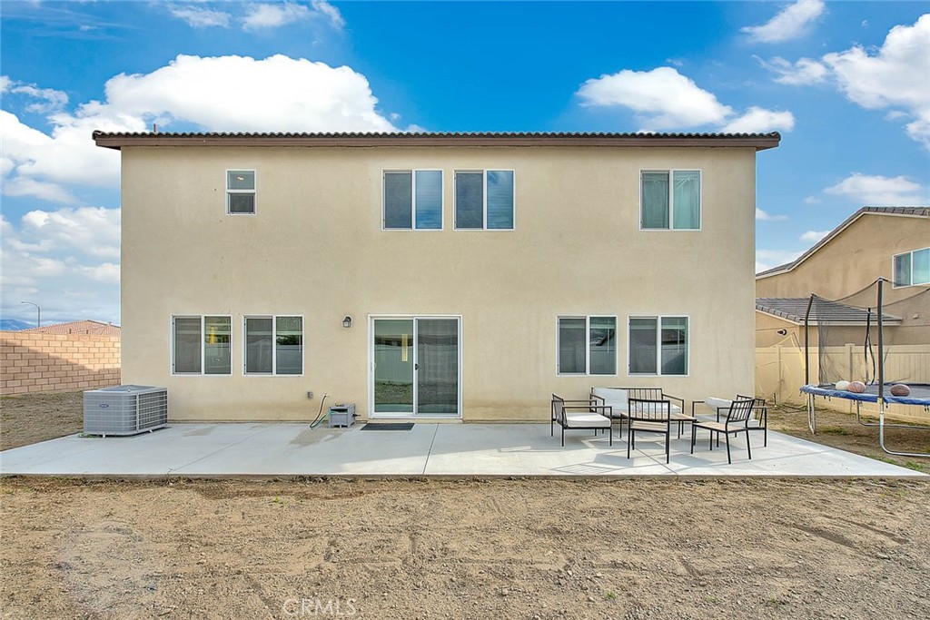 885 Canopy Lane San Jacinto, CA 92583 - Photo 22 of 75 a front view of a house with garden