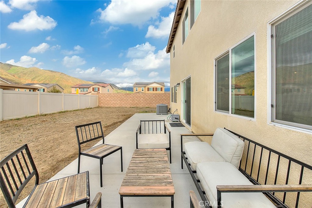 885 Canopy Lane San Jacinto, CA 92583 - Photo 28 of 75 a view of a balcony with furniture