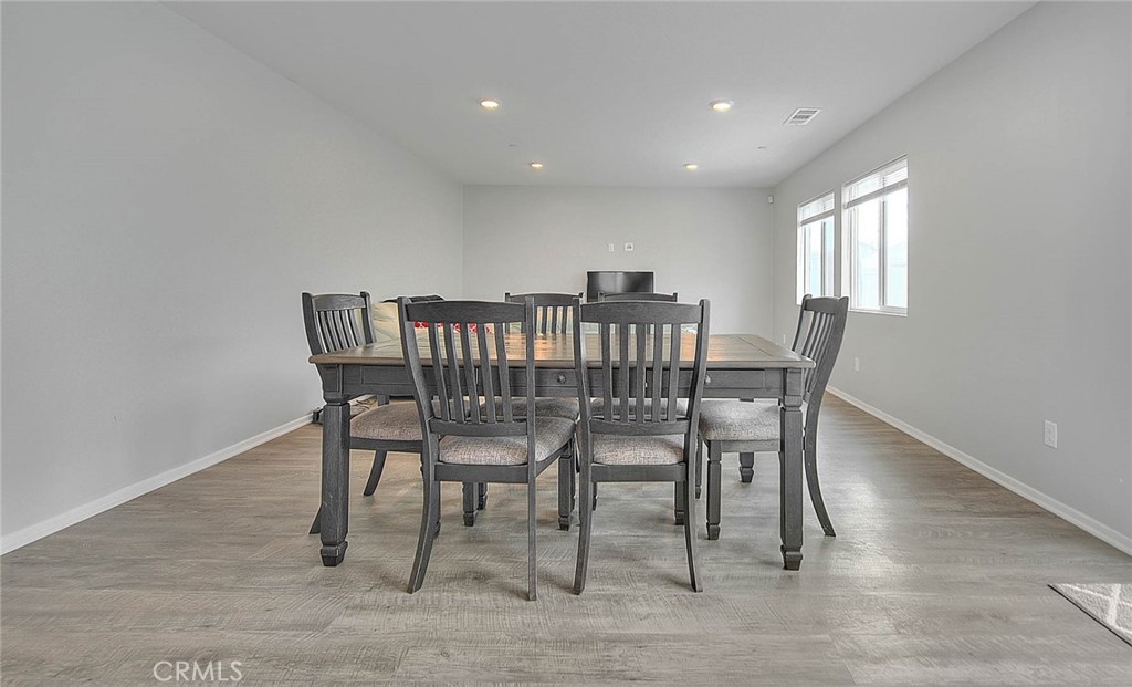 885 Canopy Lane San Jacinto, CA 92583 - Photo 37 of 75 a view of a dining room with furniture