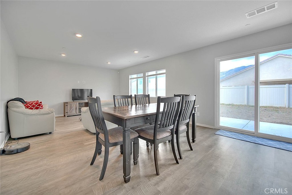 885 Canopy Lane San Jacinto, CA 92583 - Photo 38 of 75 a view of a dining room with furniture window and outside view