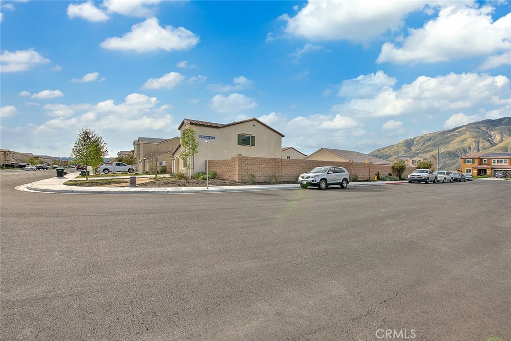 885 Canopy Lane San Jacinto, CA 92583 - Photo 5 of 75 a car parked on the side of the road