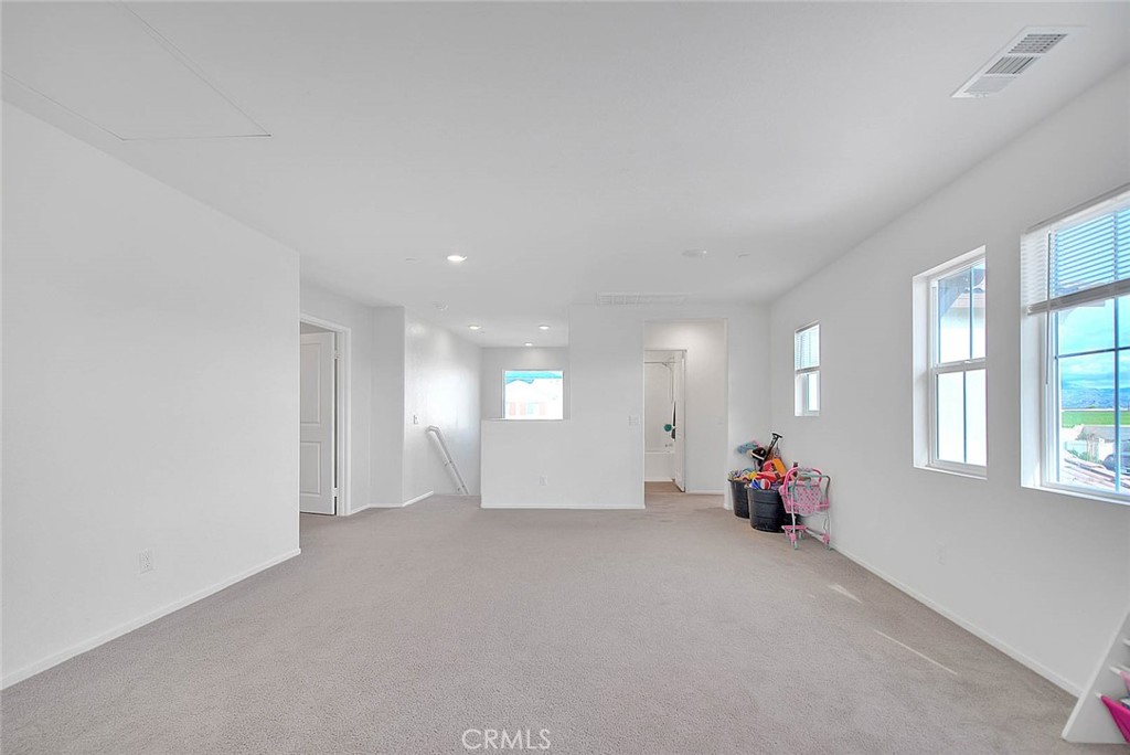 885 Canopy Lane San Jacinto, CA 92583 - Photo 63 of 75 a view of a room with window and a couch