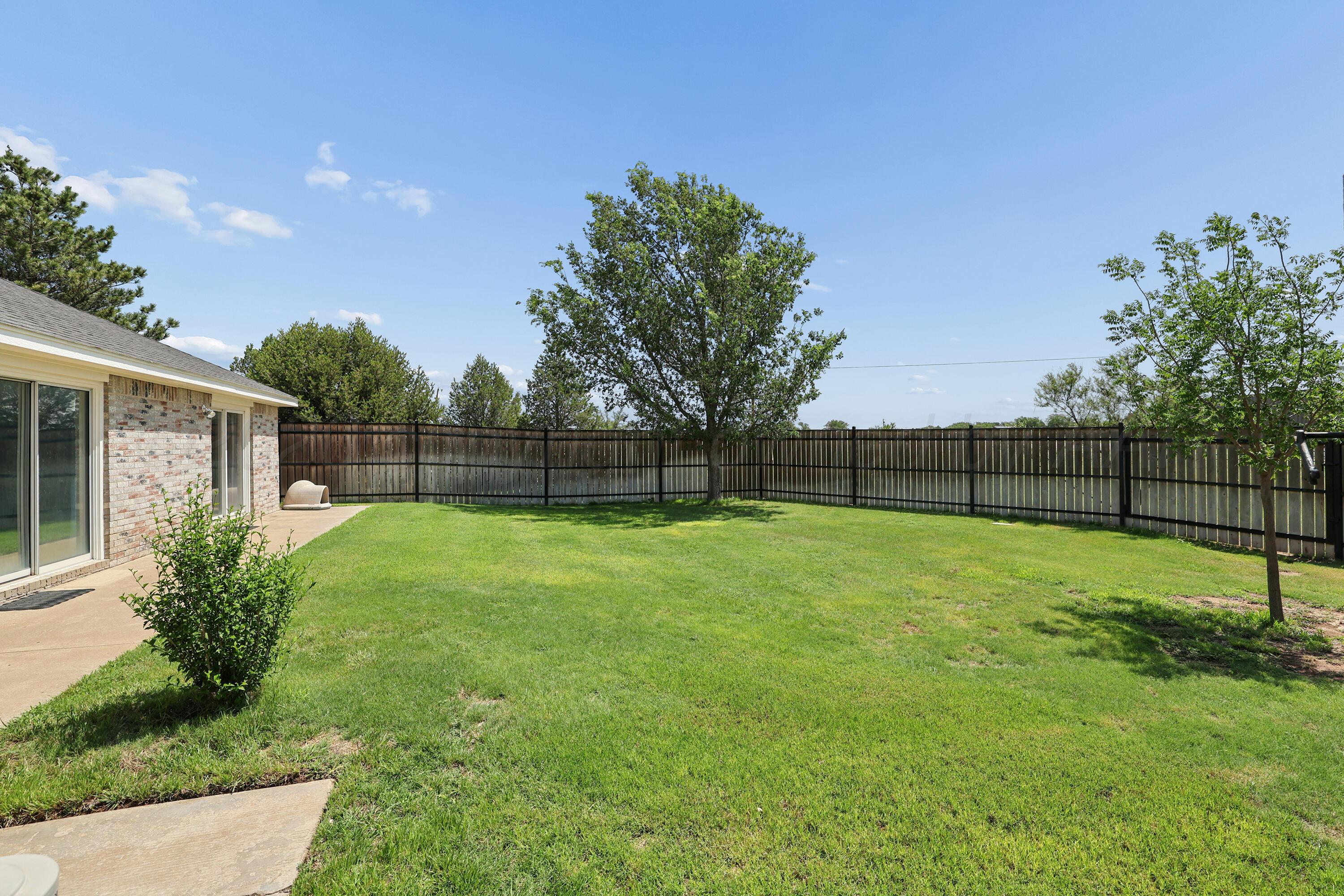 5621 White Fence Road Canyon, TX 79015 - Photo 37 of 56 37-Fenced Backyard