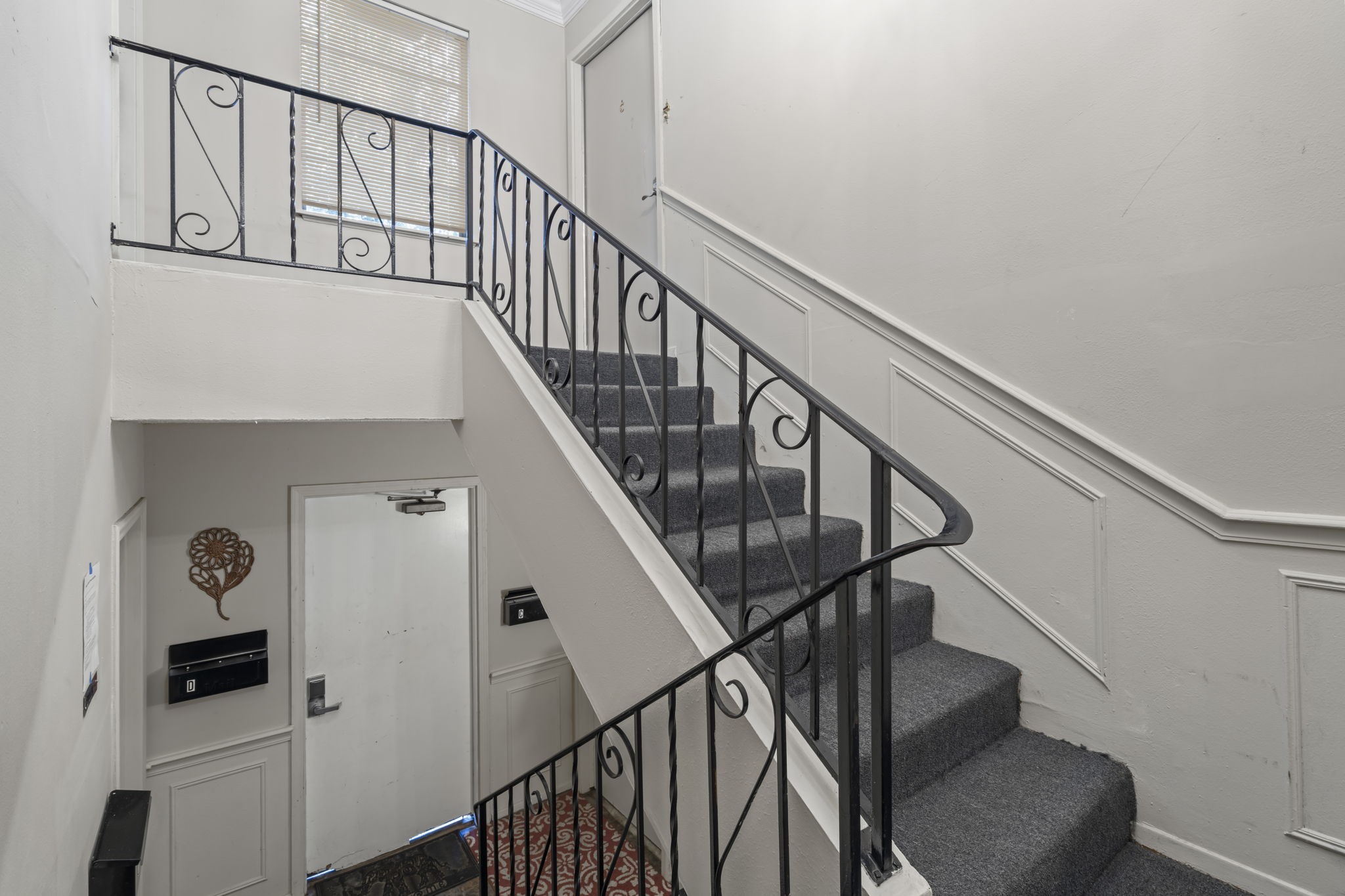 11607 Chimney Rock Road, Unit C Houston, TX 77035 - Photo 4 of 18 a view of entryway and hall with wooden floor