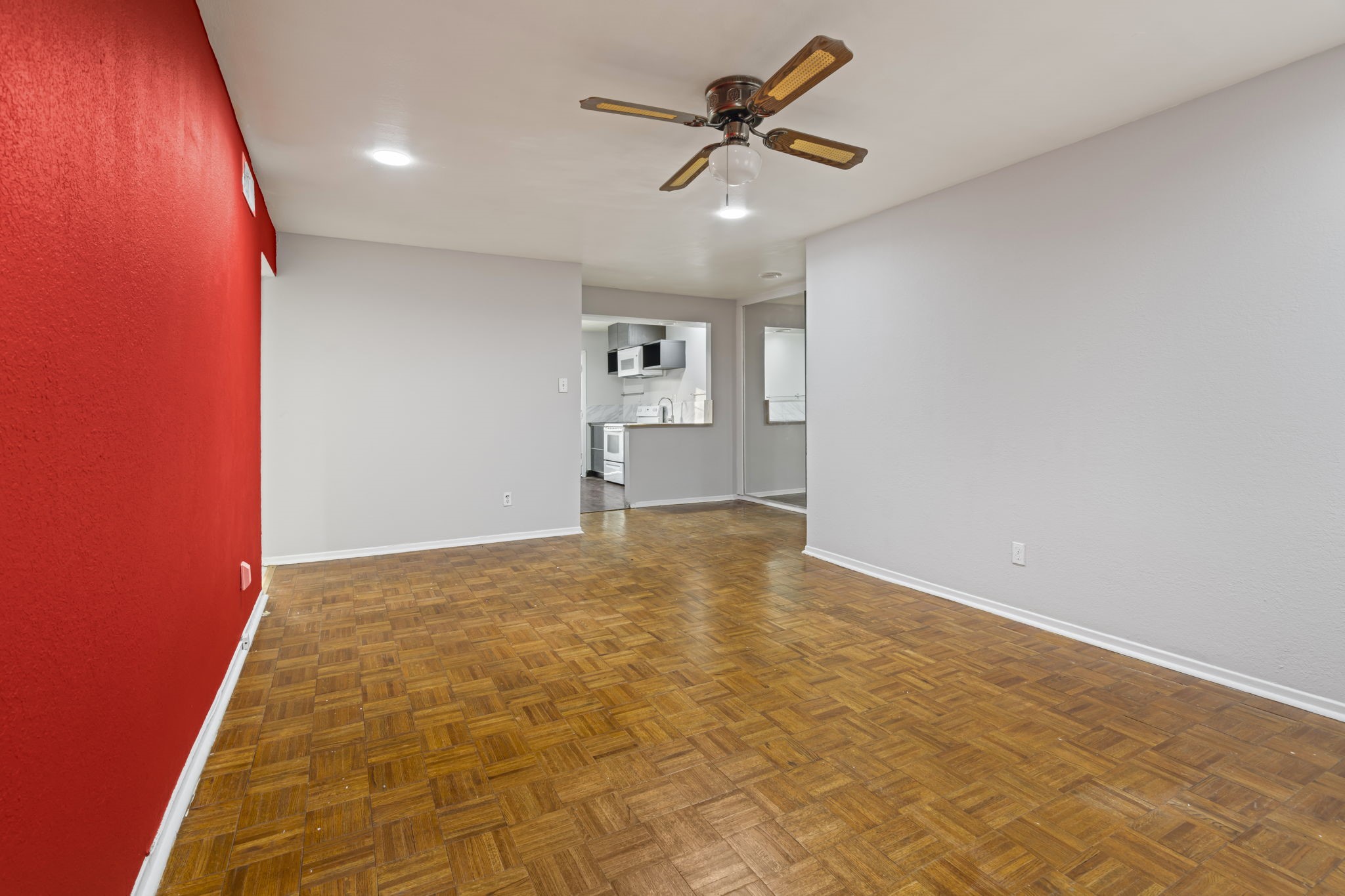 11607 Chimney Rock Road, Unit C Houston, TX 77035 - Photo 6 of 18 a view of empty room with a ceiling fan