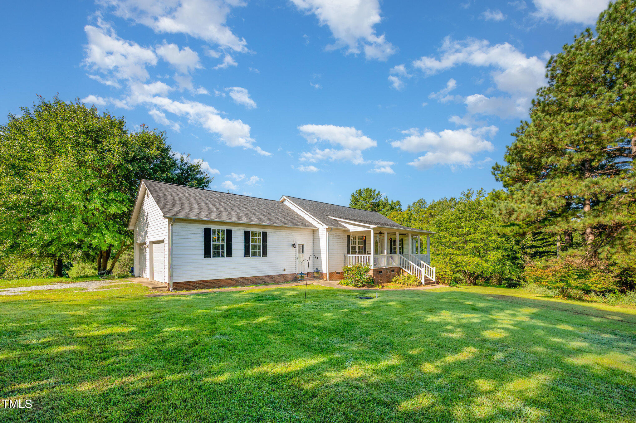 a view of a house with a big yard