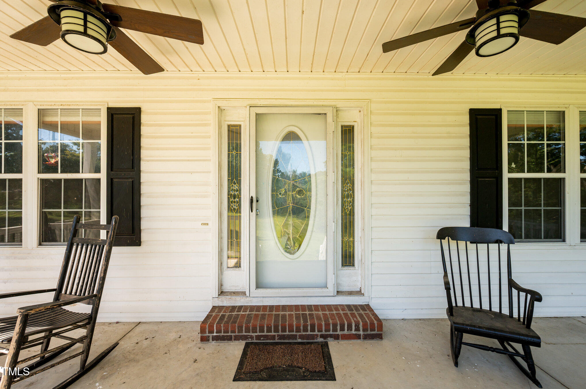 475 Jim Moore Road Timberlake, NC 27583 - Photo 19 of 26 a front view of a house with a porch