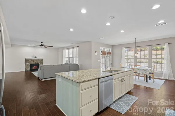 a kitchen with a stove and cabinets